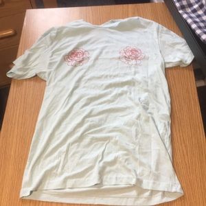 Trendy light blue shoe sleeve t-shirt: “Revice”